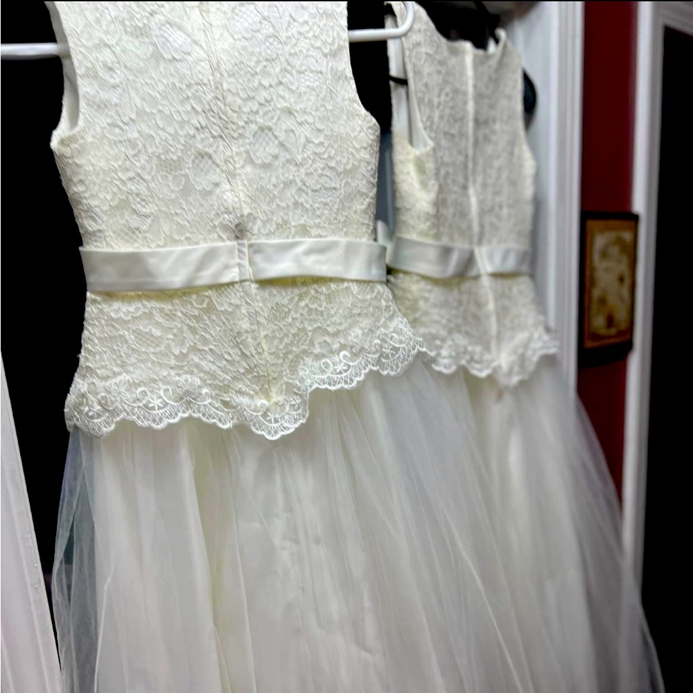 Beauty flower girls dresses or just any occasion both are a size 8-9
